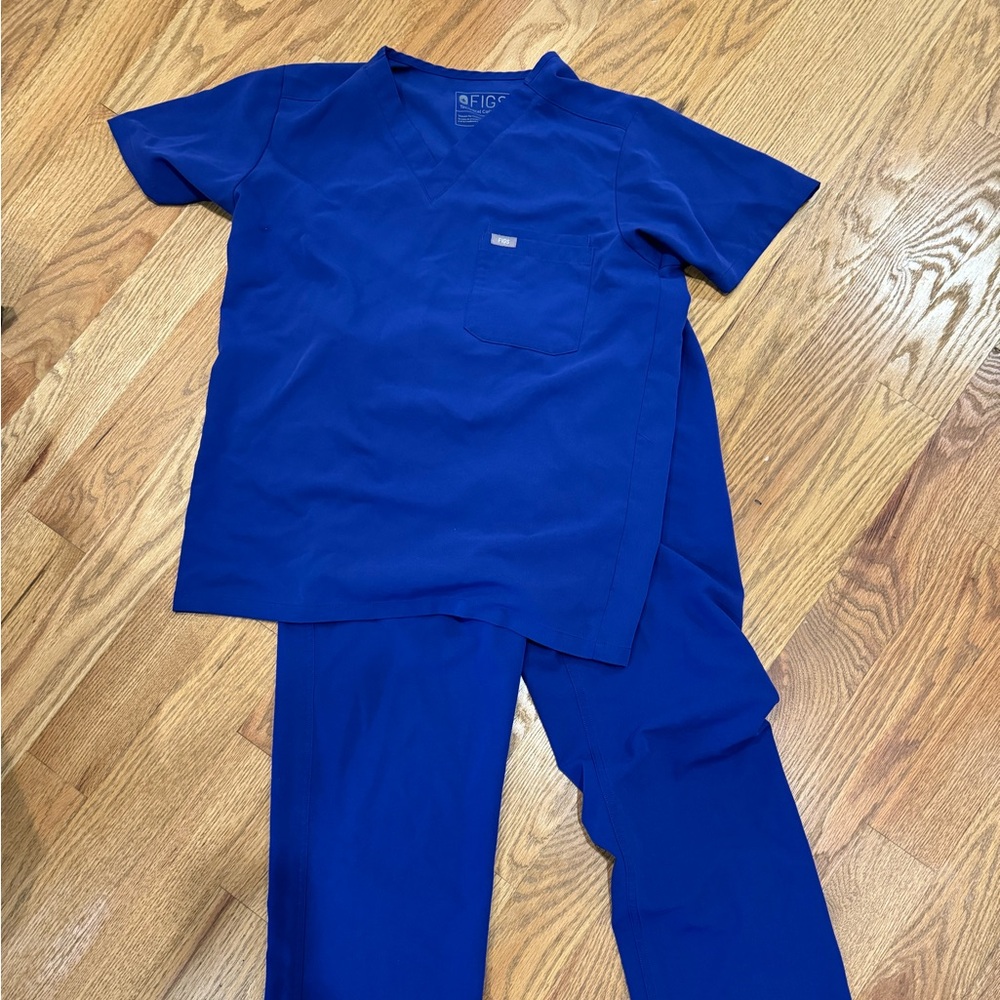 Three sets of FIGS scrubs men’s size small